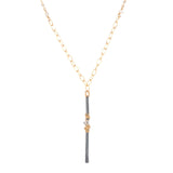 Sterling silver gunmetal finish vertical bar pendant with gold wraps and herkimer diamonds