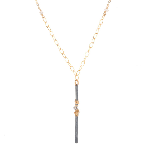 Sterling silver gunmetal finish vertical bar pendant with gold wraps and herkimer diamonds